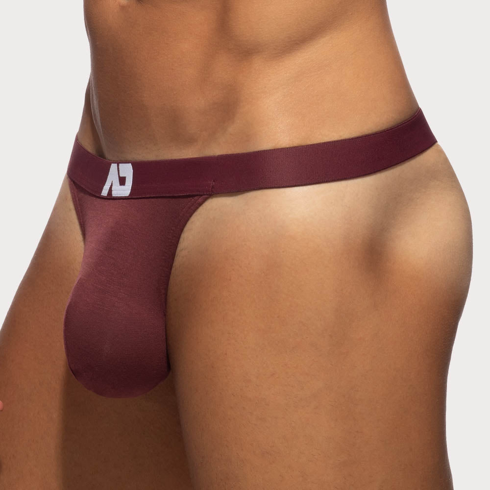Addicted Bamboo Skin Layer Thong - Herren String-Tanga aus weicher Bambus-Viskose mit großzügigem Front-Pouch in dunkelrot, side