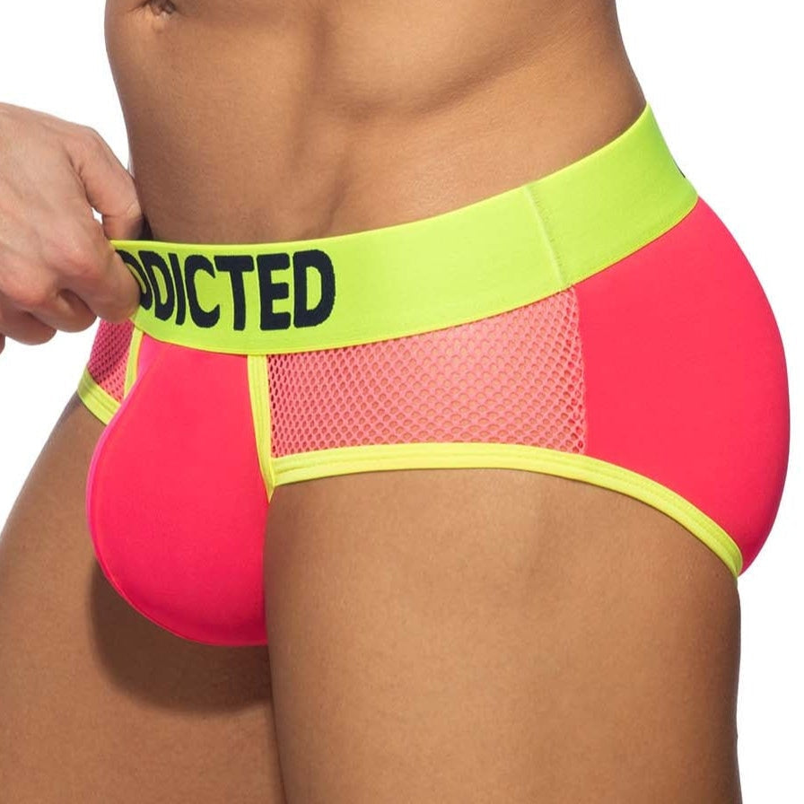 Addicted Neon Mesh Brief - auffälliger Männer Slip mit Mesh Elementen, neonpink-gelb