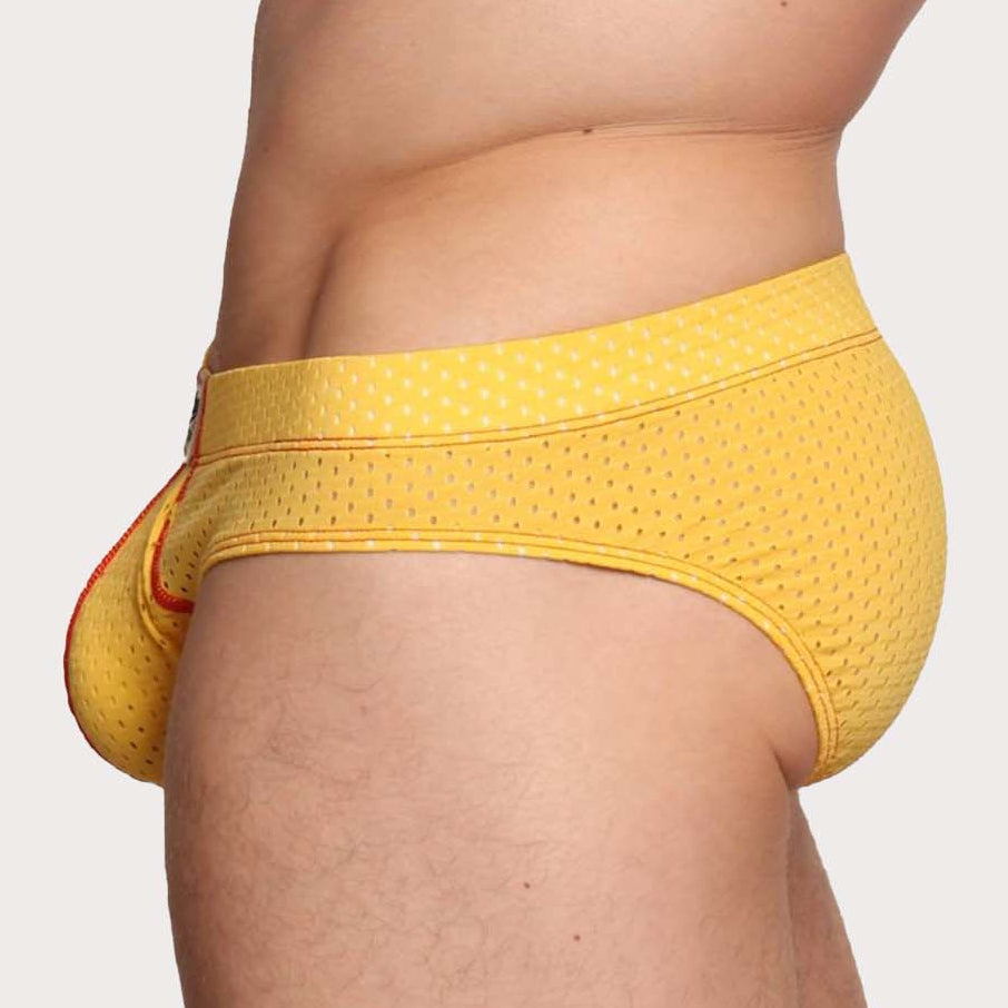 Marcuse Bussine Brief - Männer Slip aus atmungsaktivem Mesh mit herausnehmbarer Push-Up Einlage in gelb, side