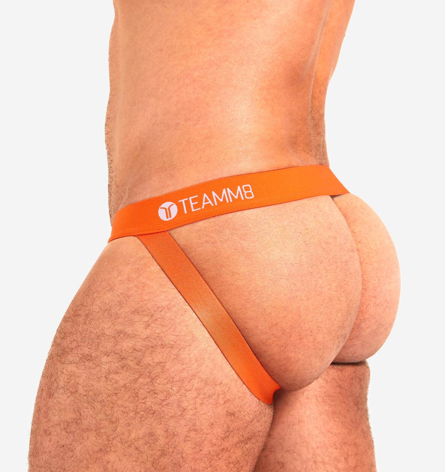 Jockstrap 'SUPER LOW' von TEAMM8 in knalligem Orange, Rückansicht