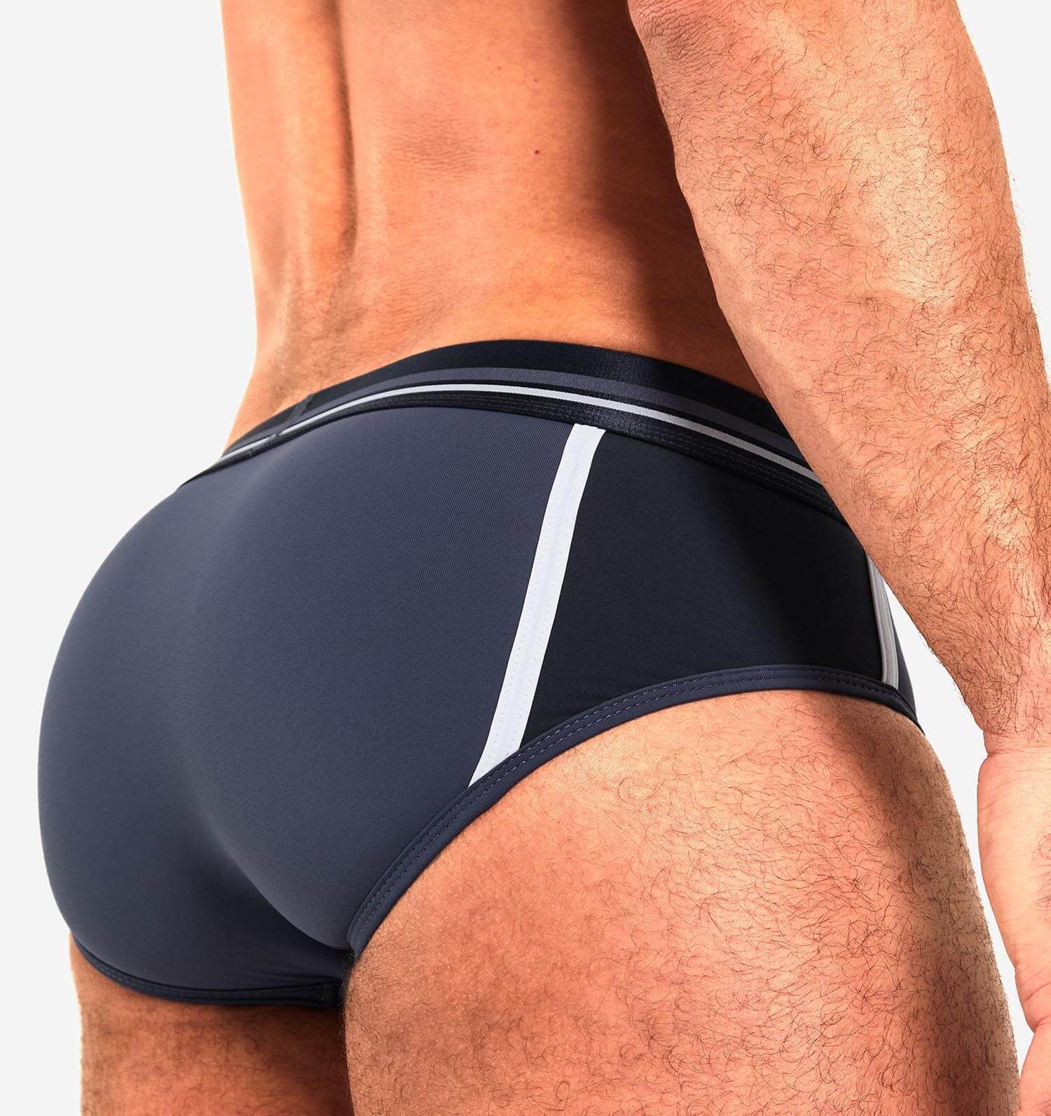 Sporlticher Herren Slip 'BASE BRIEF' von TEAMM8 in navy-blau, Rückansicht